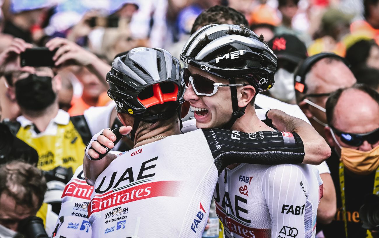 Tadej Pogacar congratulates Adam Yates on his Stage 1 victory at the Tour de France 2023.