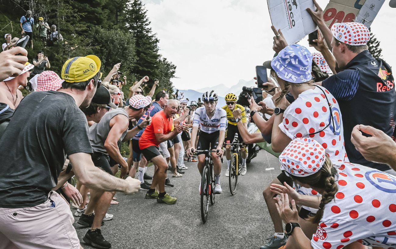 Tadej Pogacar leads Jonas Vingegaard near the top of the Col de Jeux Plane on Stage 14 of the Tour de France 2023.