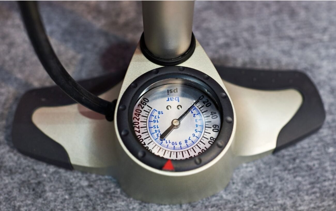 Close-up of the pressure gauge on a track pump for hybrid bikes.
