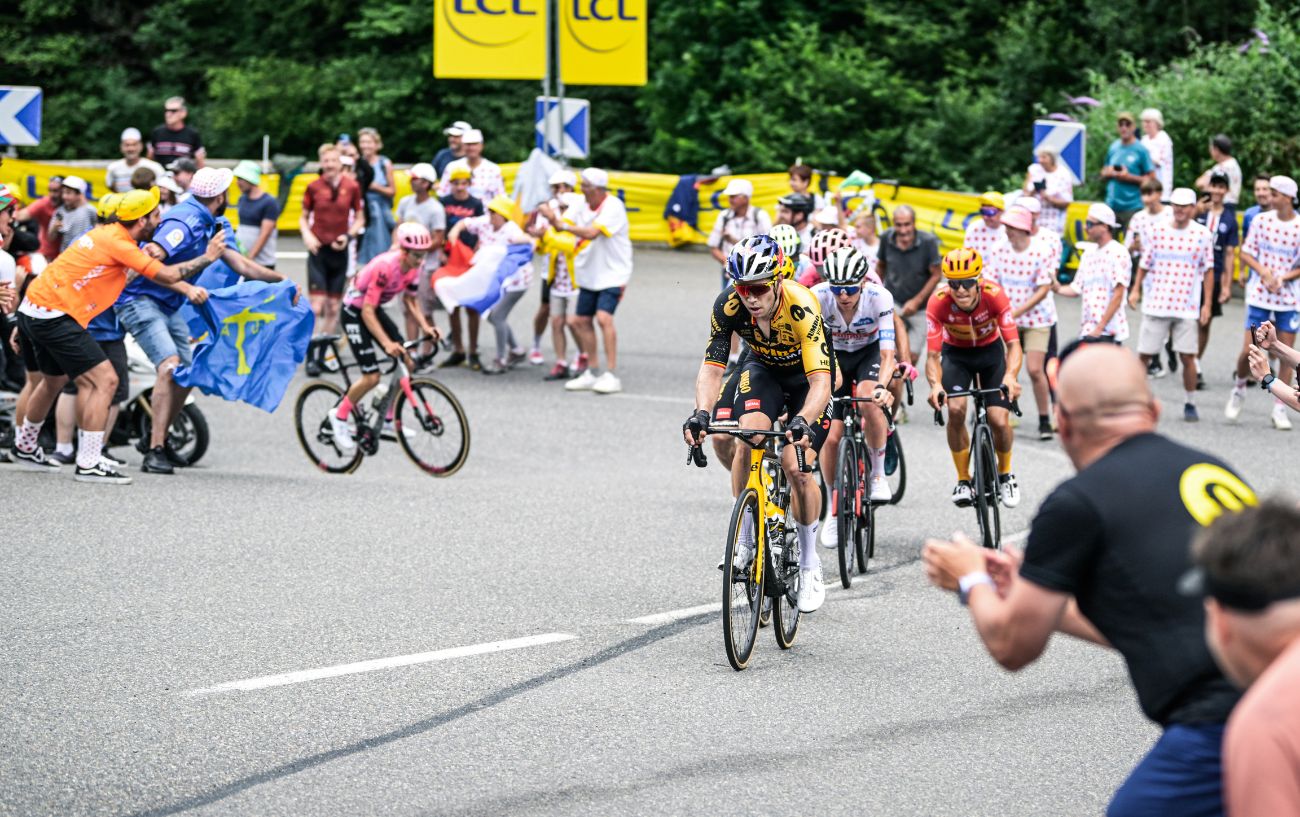 Wout van Aert leads an elite group up the final climb of Tour de France Stage 6.