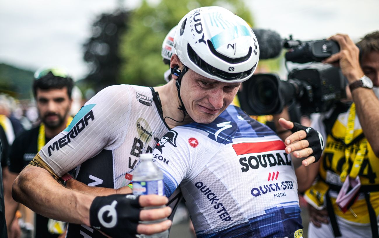 Matej Mohoric embraces Julian Alaphilippe after winning Stage 19 of the 2023 Tour de France.