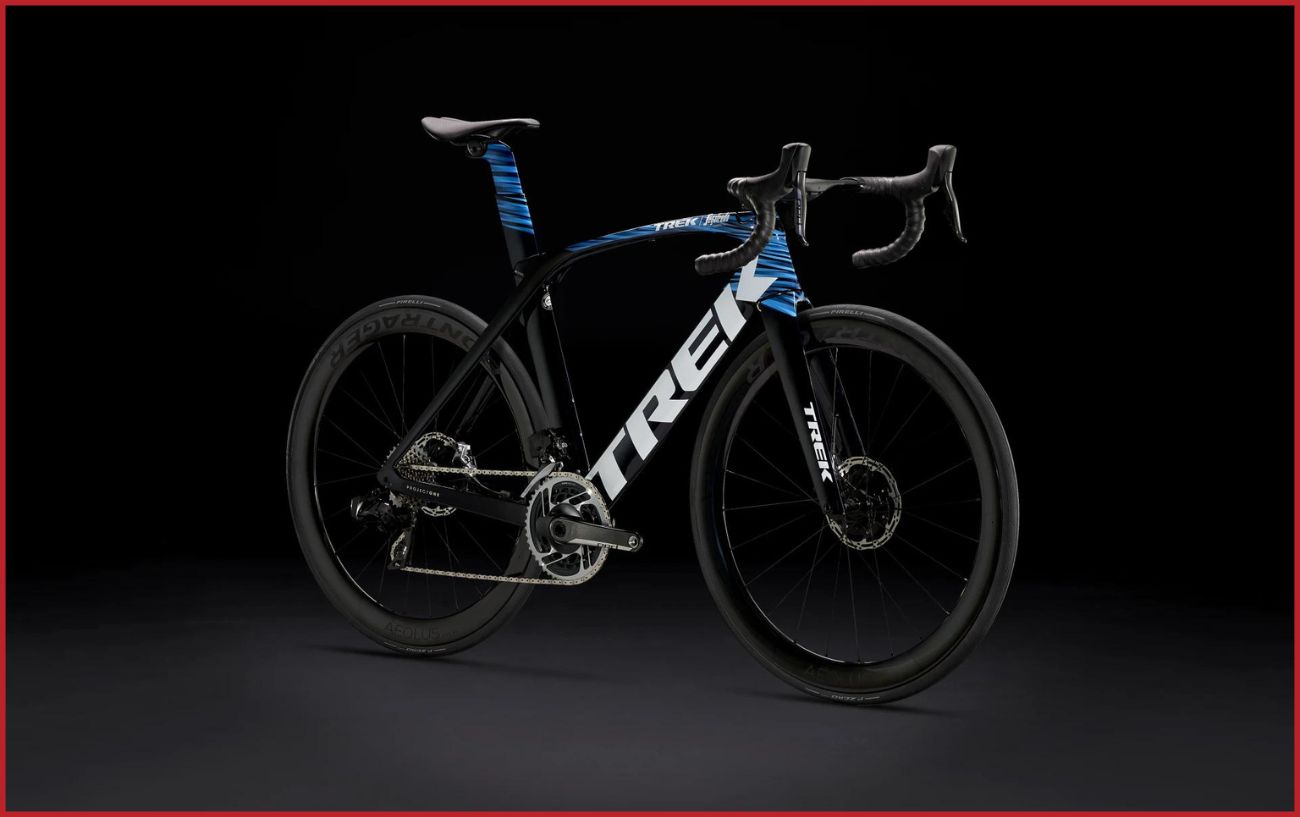 The Trek Madone photographed against a black background.