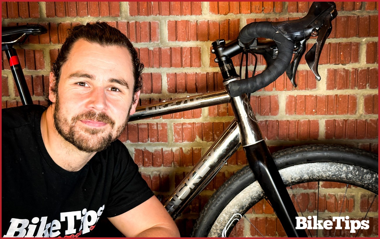 Robbie Ferri, the author in front of a gravel bike.