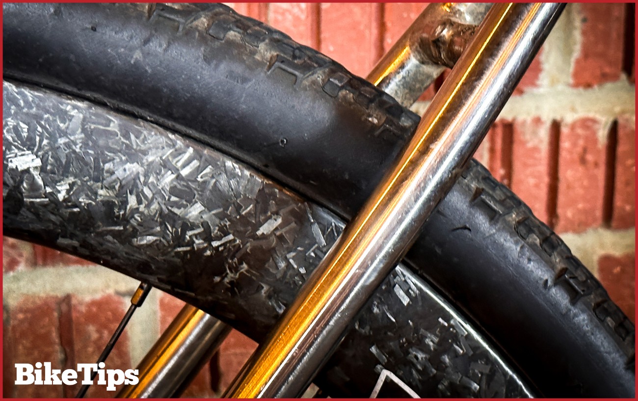 A close up of a carbon fiber gravel wheel.
