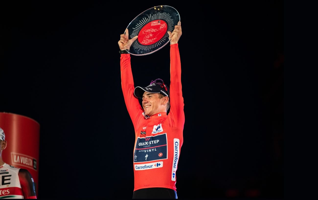 Remco Evenepoel celebrates winning the 2022 Vuelta a España.