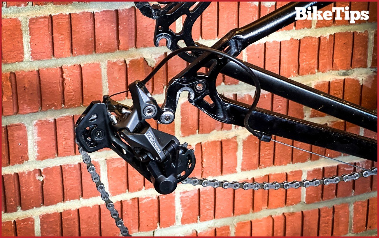 A rear hanger and derailleur of a mountain bike.
