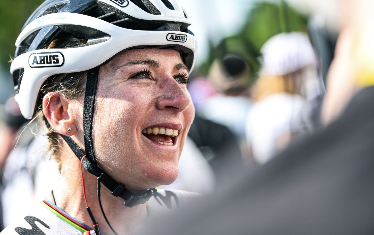 Annemiek van Vleuten, who has just retired from cycling, smiles at the 2023 Tour de France Femmes.