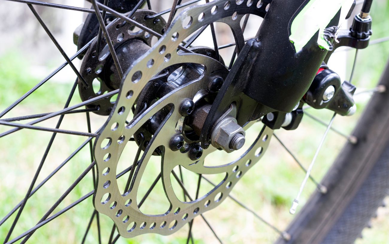 A close up of a disc brake on a mountain bike.
