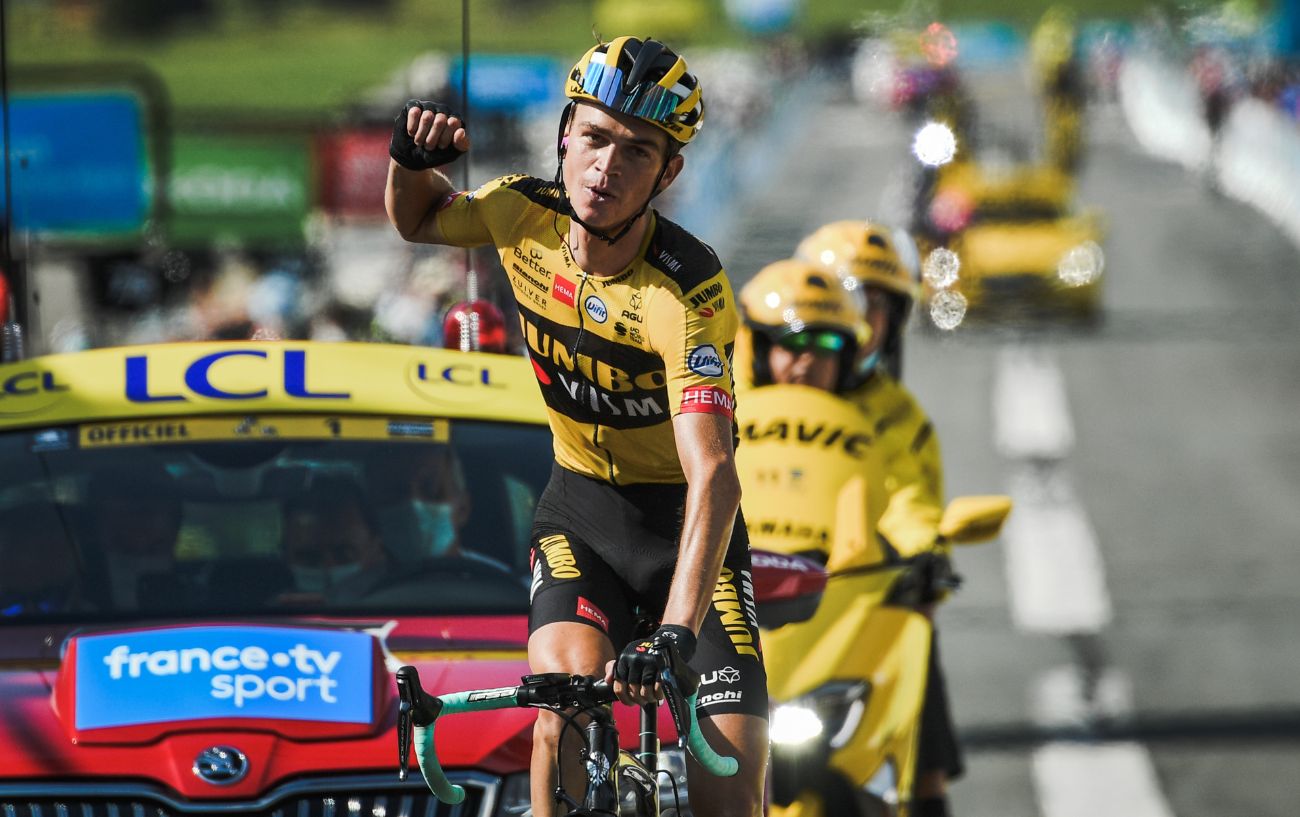 Sepp Kuss celebrates winning a stage at the Tour de France.