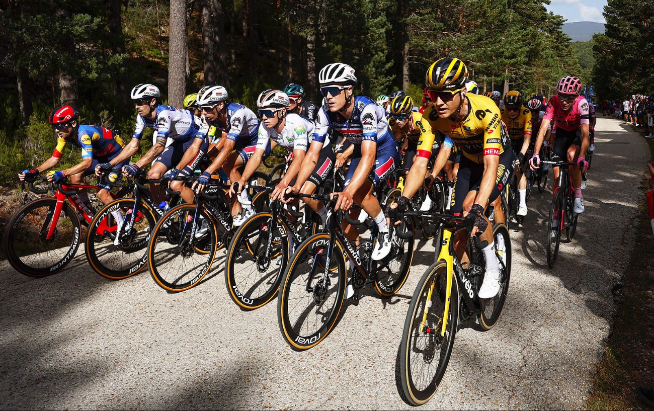 Remco Evenepoel and the rest of the GC contenders climb a forested hill on Stage 11 of the 2023 Vuelta a Espana.