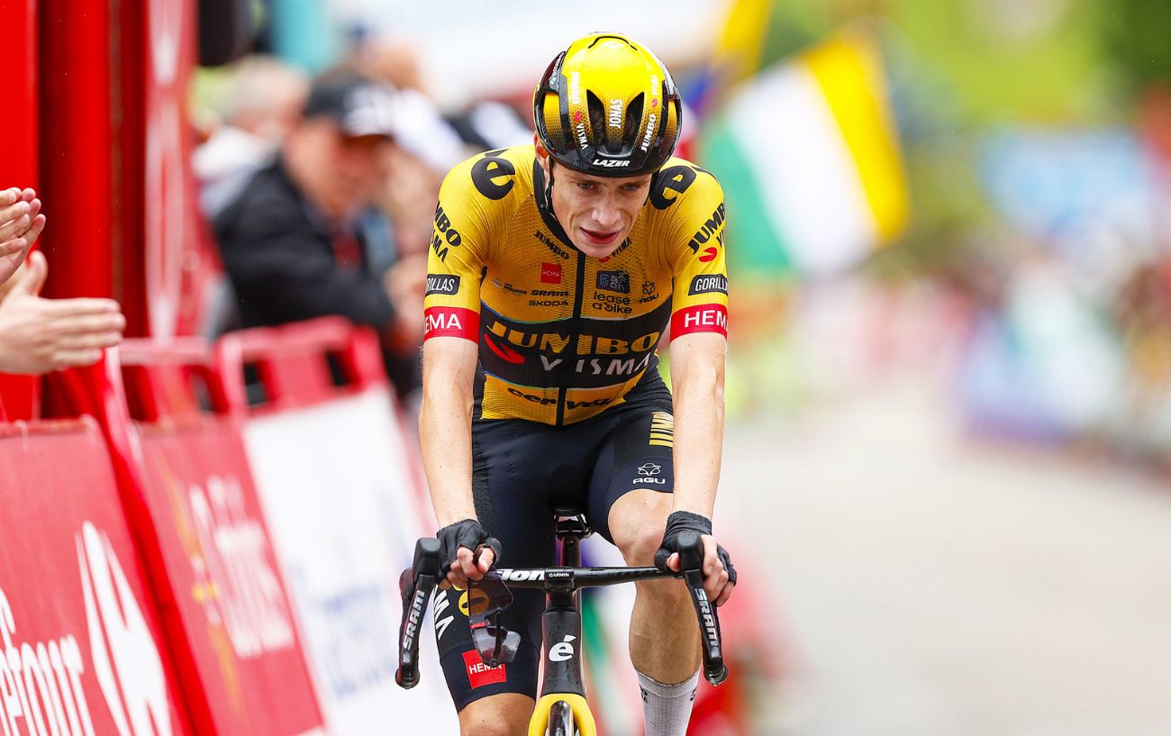 Jonas Vingegaard has a pained expression on his face as he crosses the line to win Stage 16 of the 2023 Vuelta a Espana.