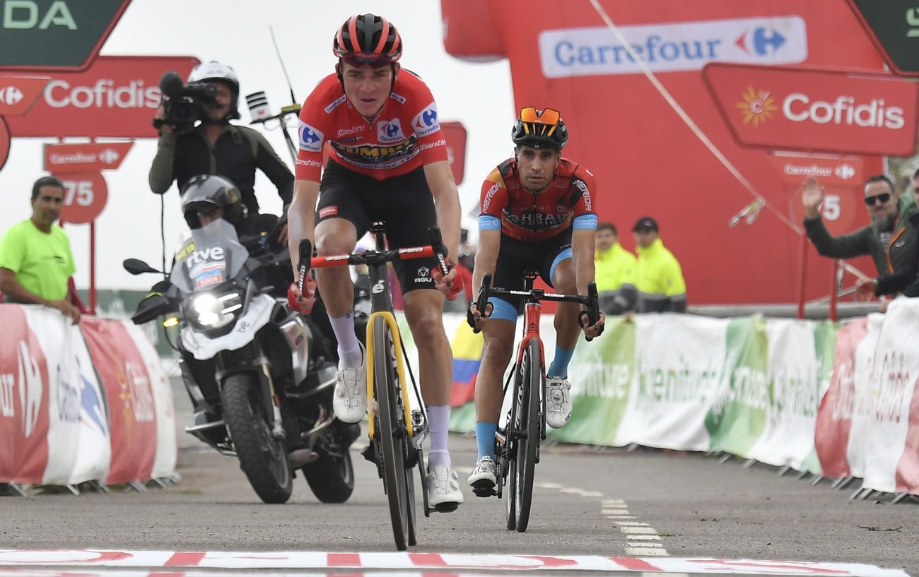 Sepp Kuss crosses the line ahead of Mikel Landa on Stage 17 of the 2023 Vuelta a Espana.