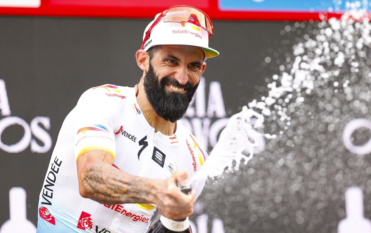 Geoffrey Soupe celebrates his victory on Stage 7 of the 2023 Vuelta a Espana by popping a bottle of champagne.