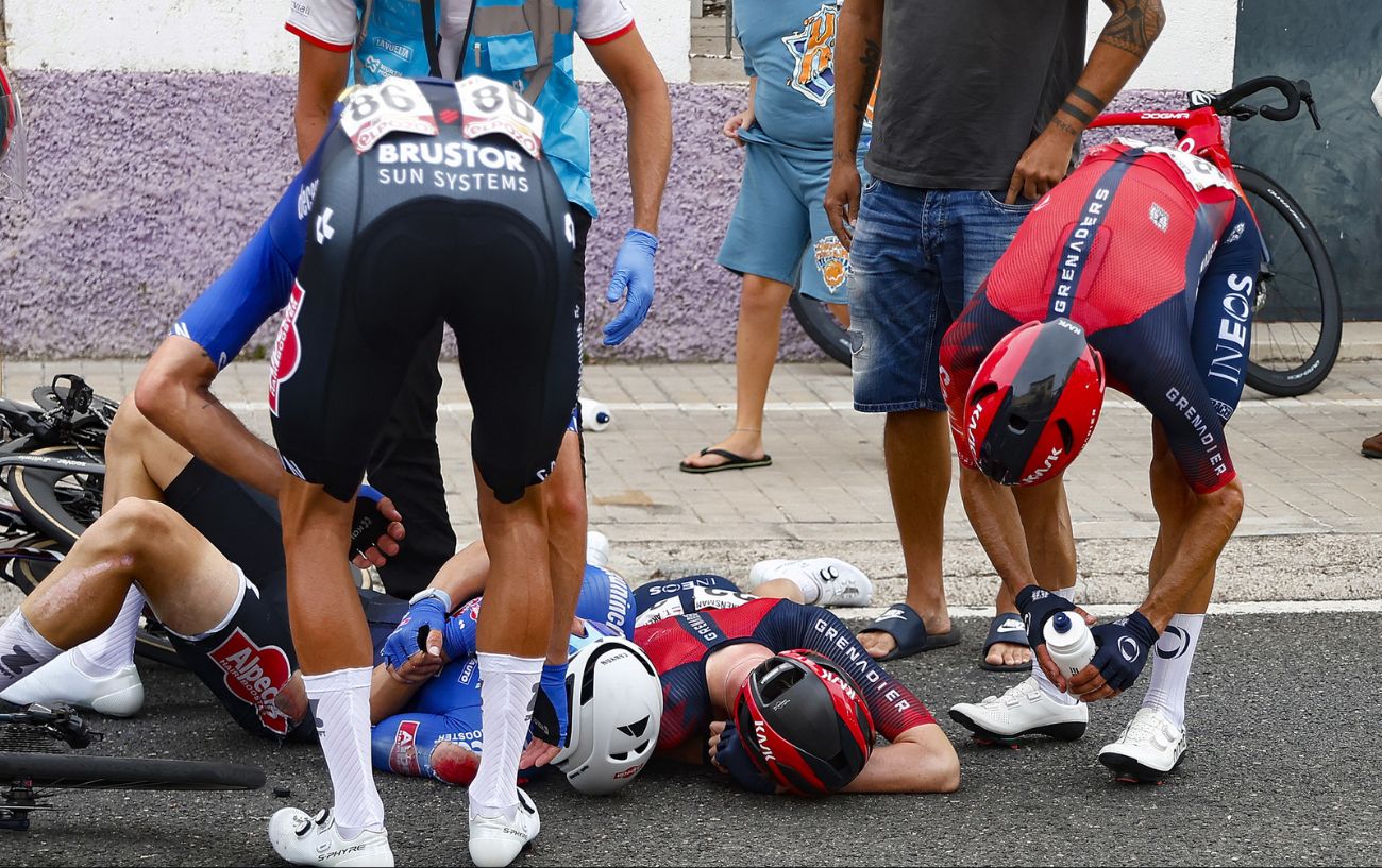 Riders lie in the road after a big crash on Stage 7 of the 2023 Vuelta a Espana.