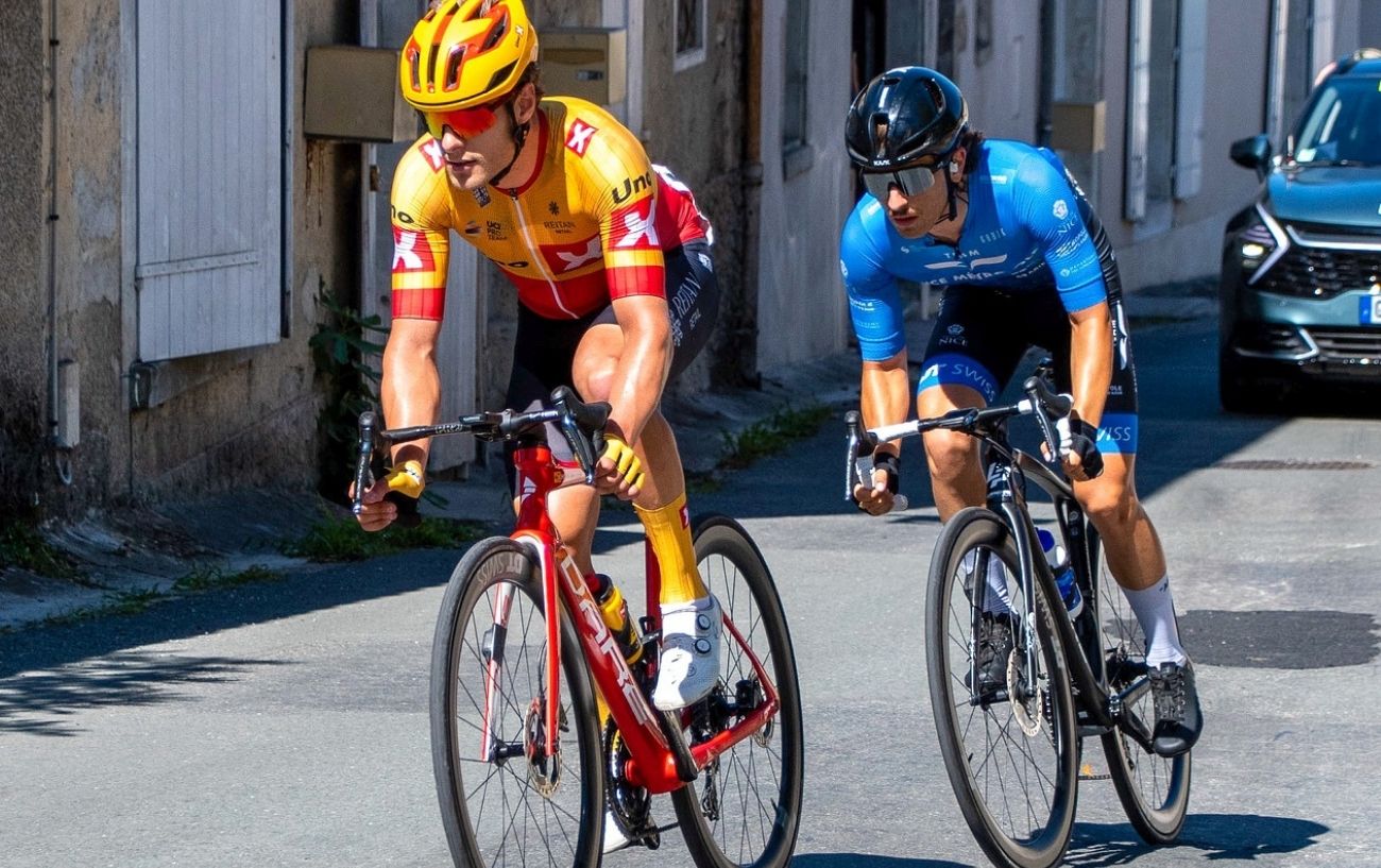 Two professional cyclists with slammed stems racing in 2023.