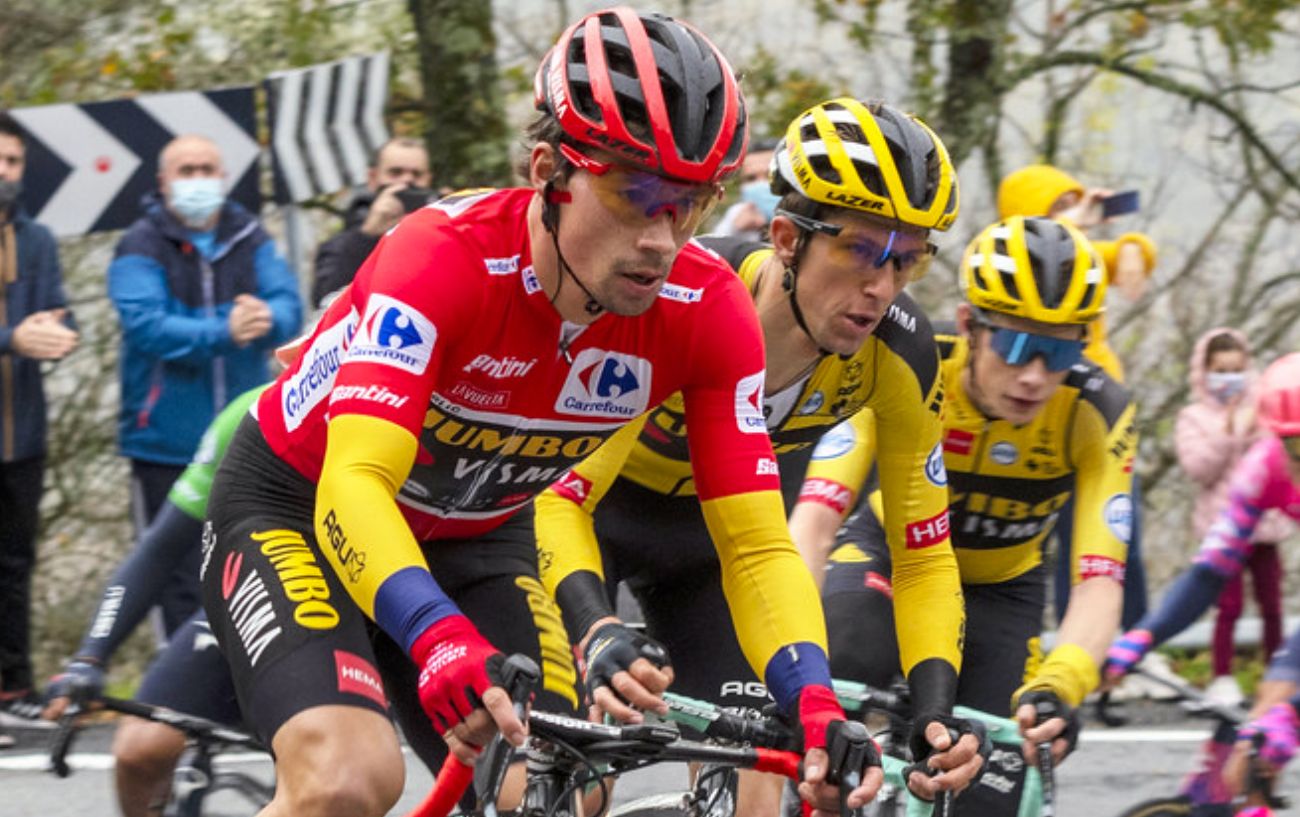 Primoz Roglic rides in the red jersey of the Vuelta a Espana for team Jumbo-Visma.