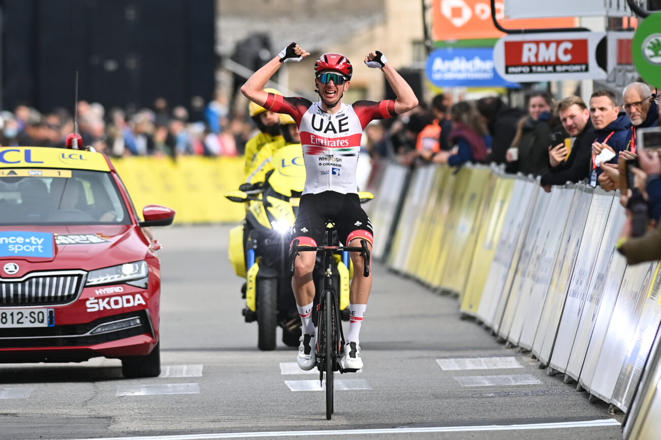 Brandon McNulty celebrates crossing the finish line at the 2022 Paris-Nice.