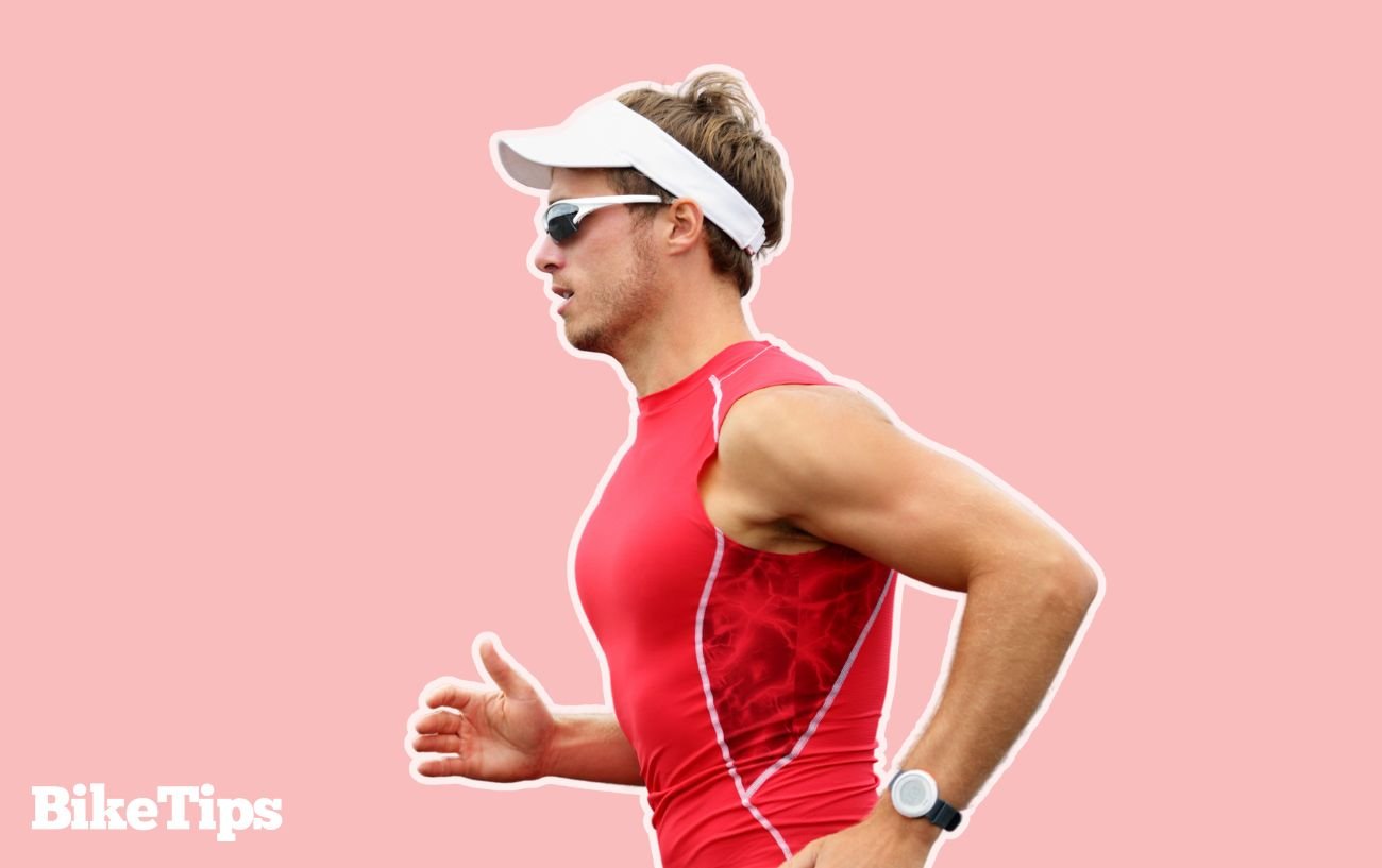 A triathlete running as part of his triathlon training.