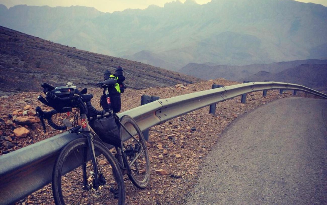 My Lynskey road bike leans on a road barrier on the Jebel Shams climb in the BikingMan Oman race.
