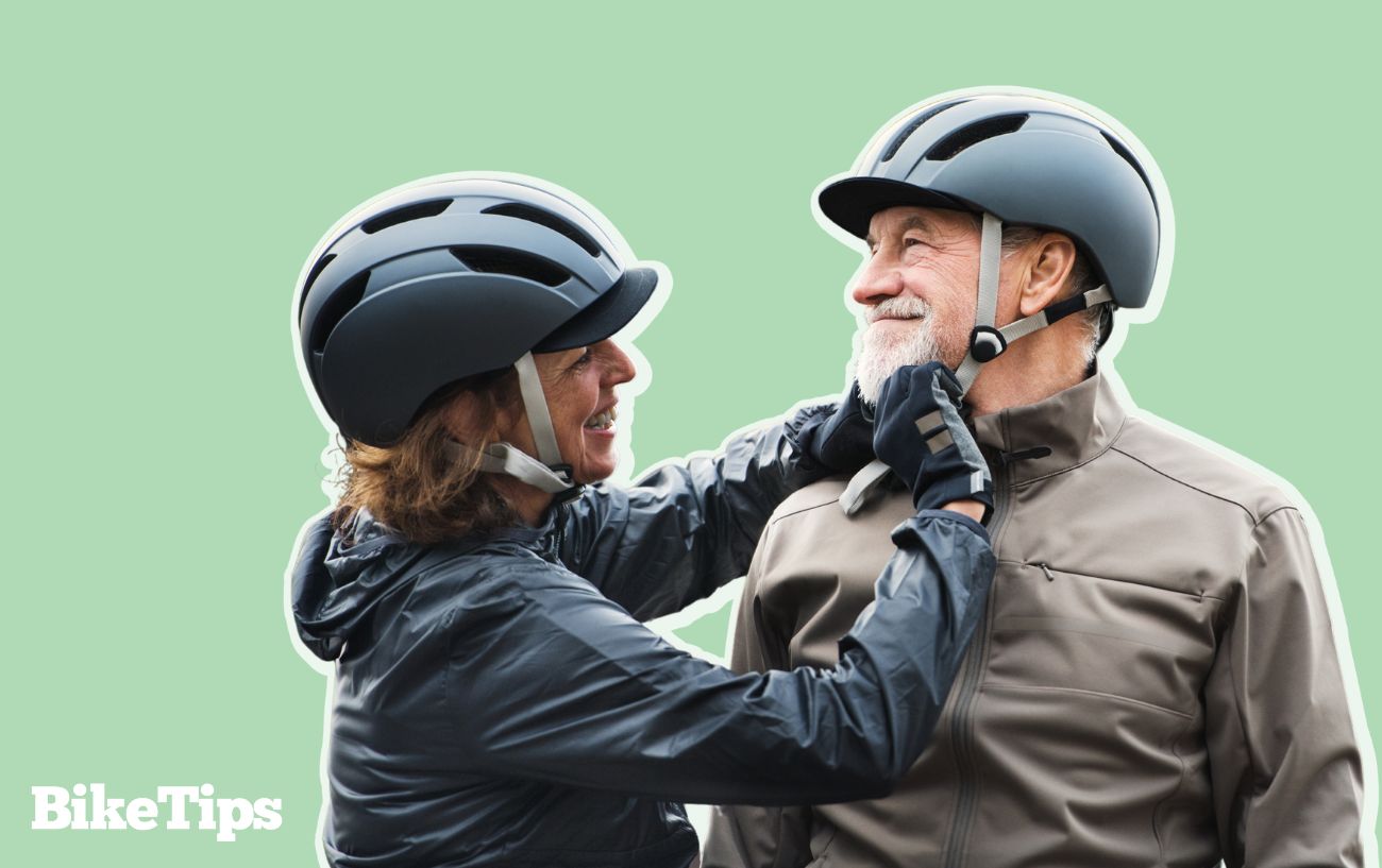 Two cyclists use the fastening systems to put helmets on one another on a green background.