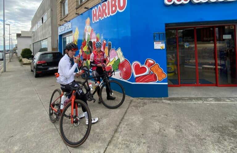 Pausing outside a bakery on our training ride.