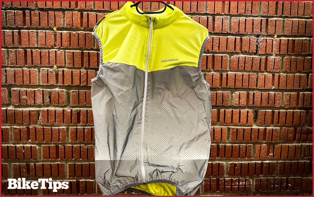 A cycling gilet in high vis and reflective material.