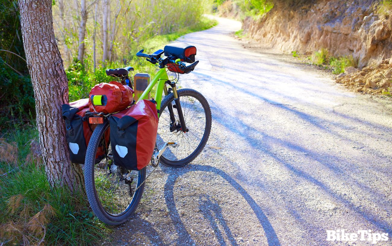 Panniers on a green mountain bike.