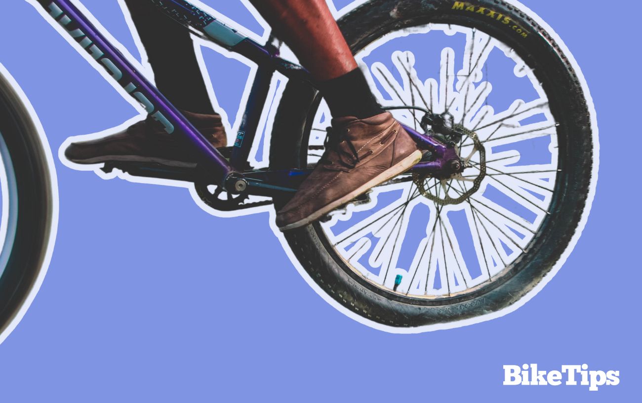 Close-up of the rear wheel of a mountain bike.