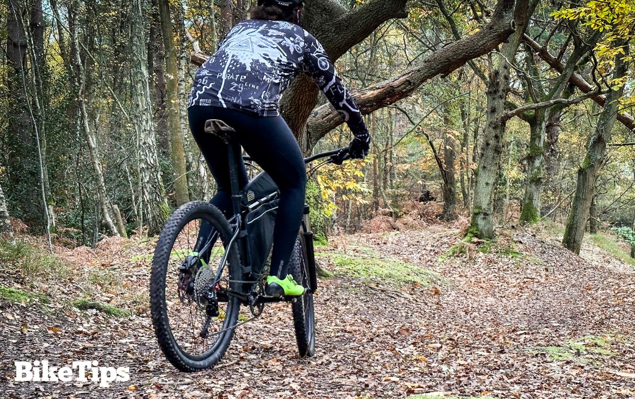 Riding a flat, easy trail, which is perfect for mountain biking for beginners.
