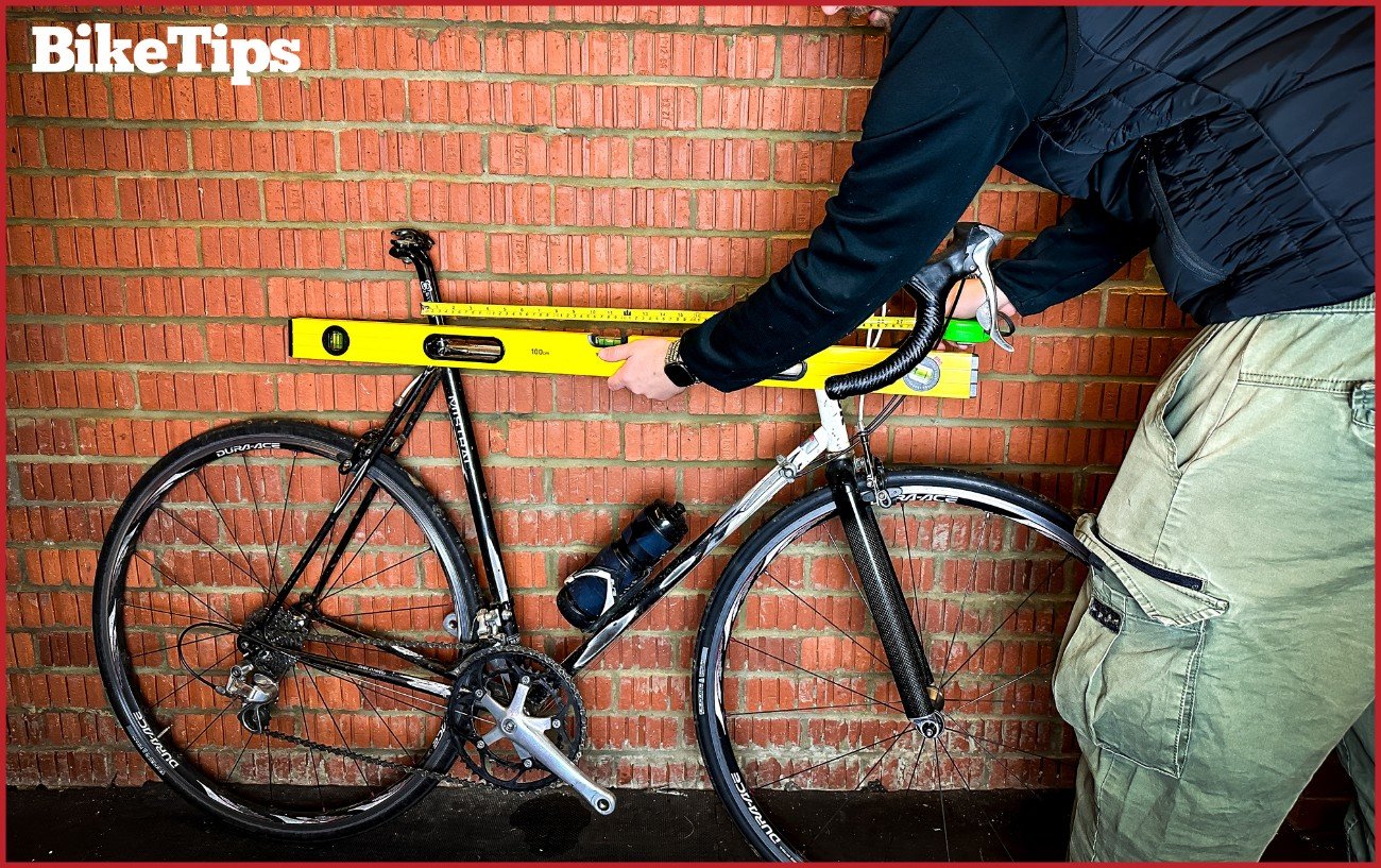 Measuring a top tube on a classic road bike.