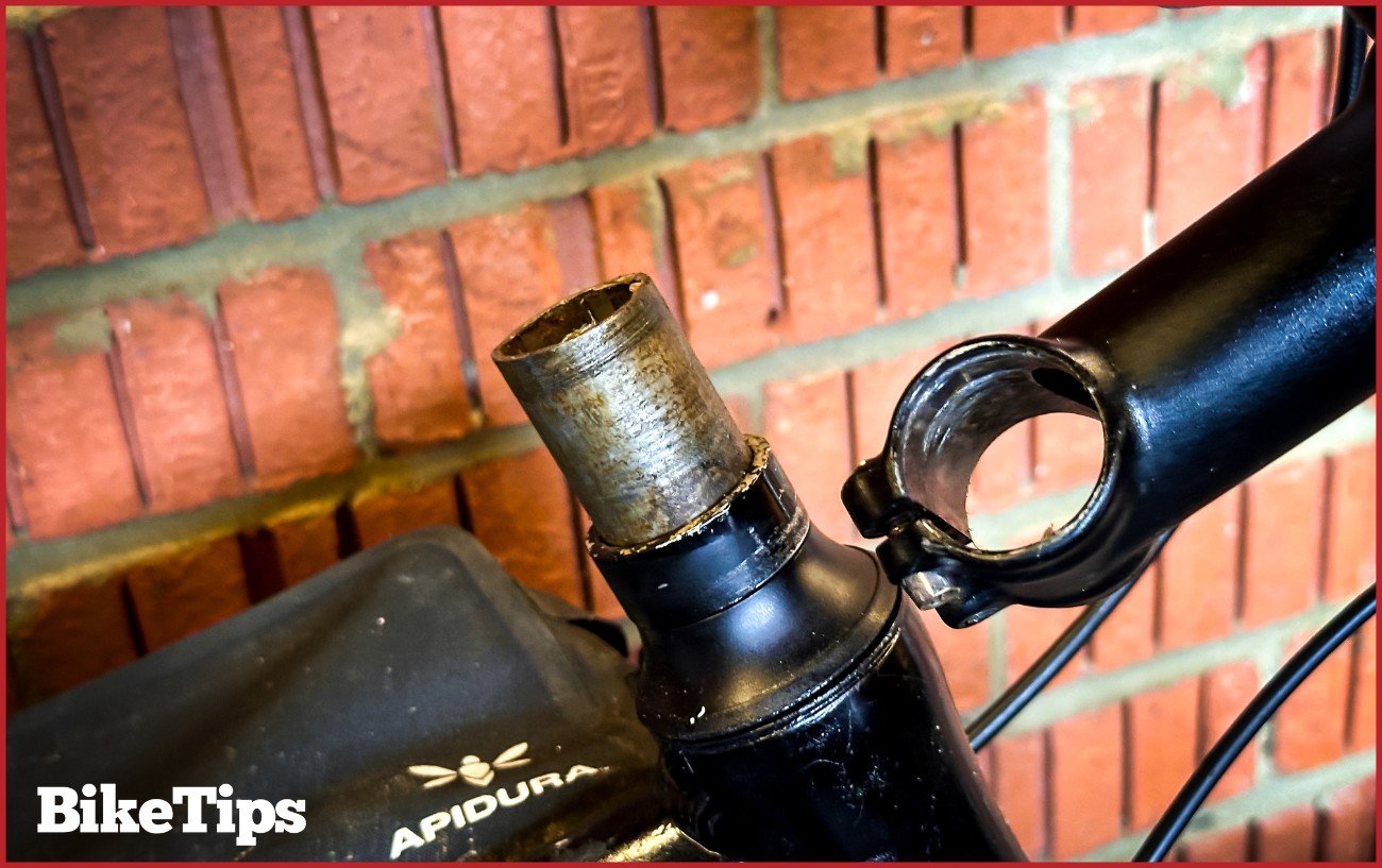 The stem off a bike with the spacers still on the fork.