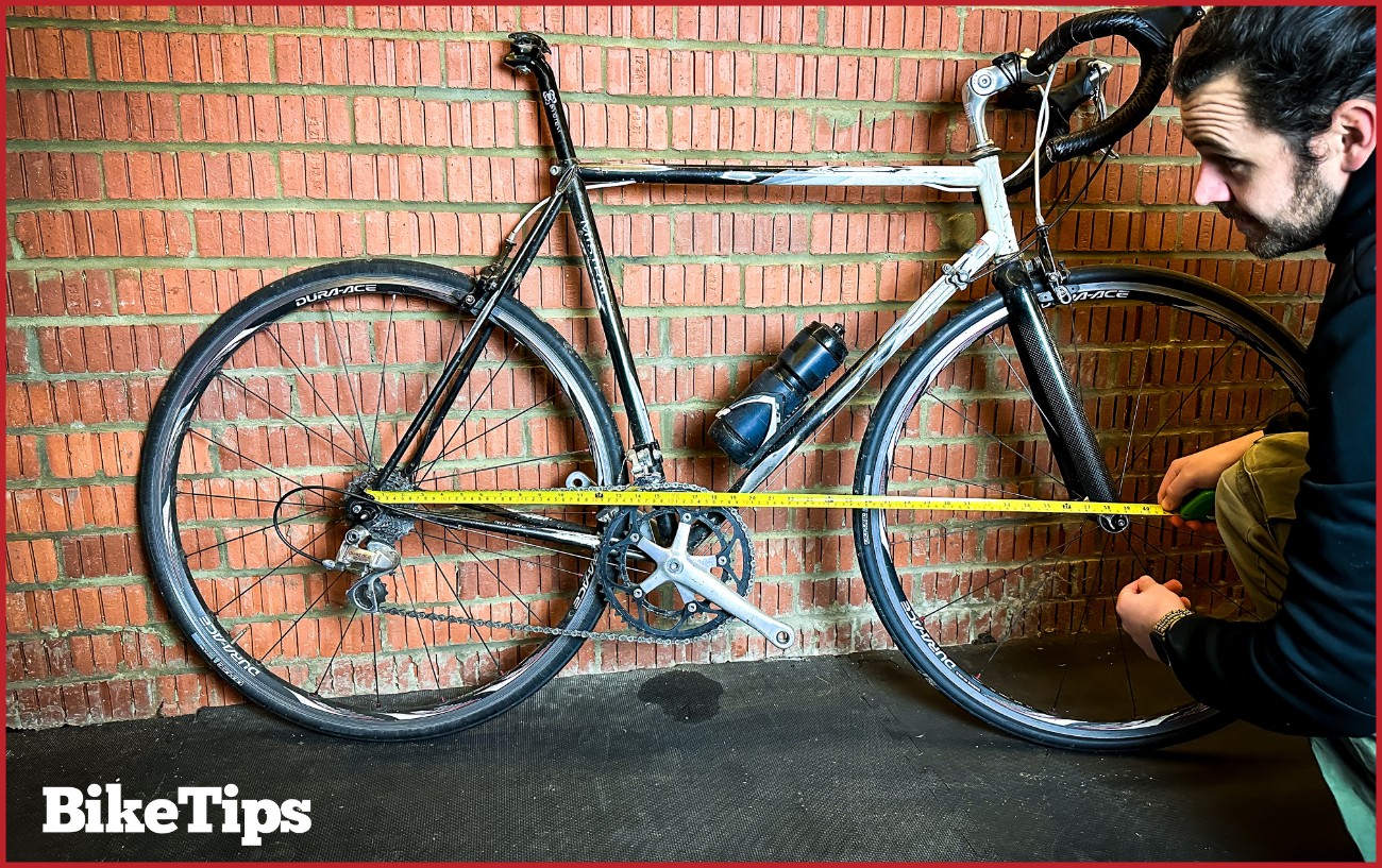 Measuring the wheelbase on a classic road bike.
