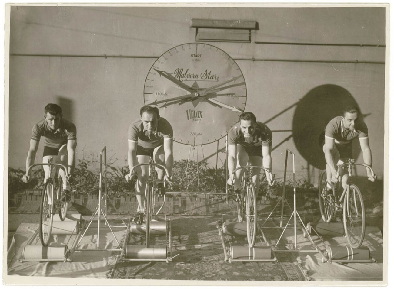 Cyclists on rollers during a publicity tour for a race series in Australia, c. 1925.