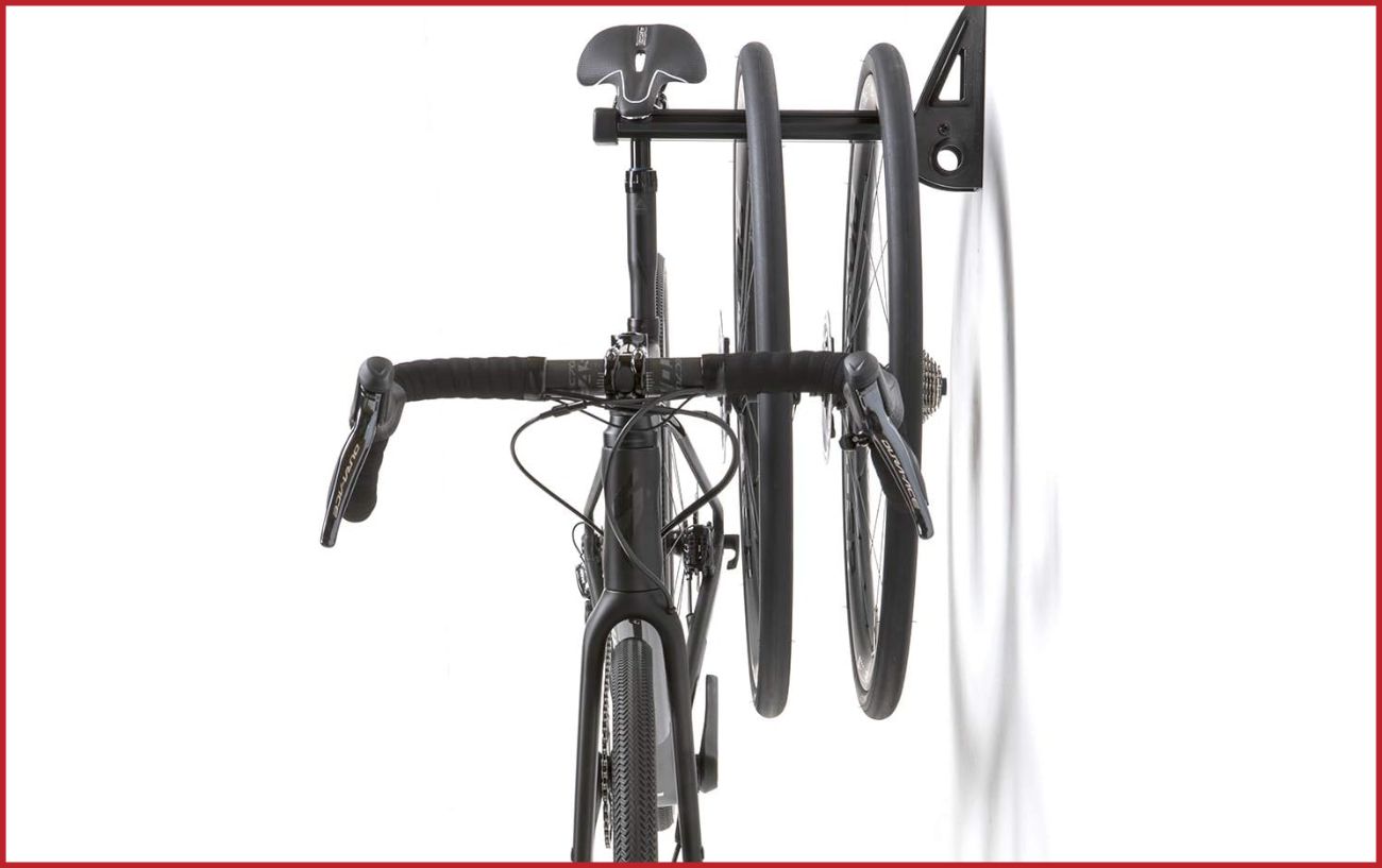 A wall post for hanging a bicycle from the wall.