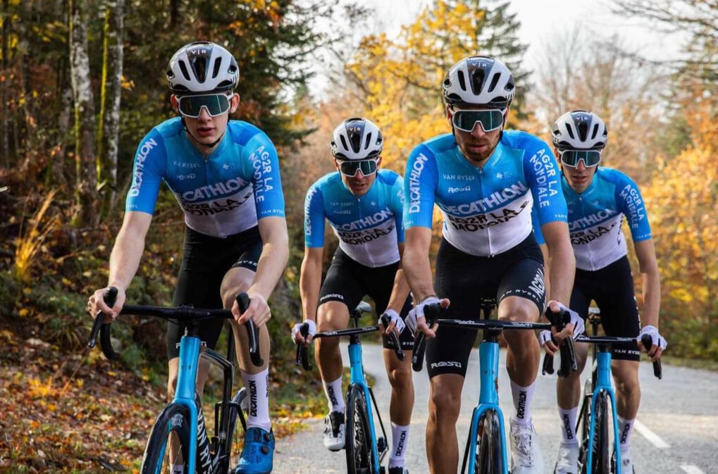The Decathlon AG2R La Mondiale team cycling in their 2024 kit.