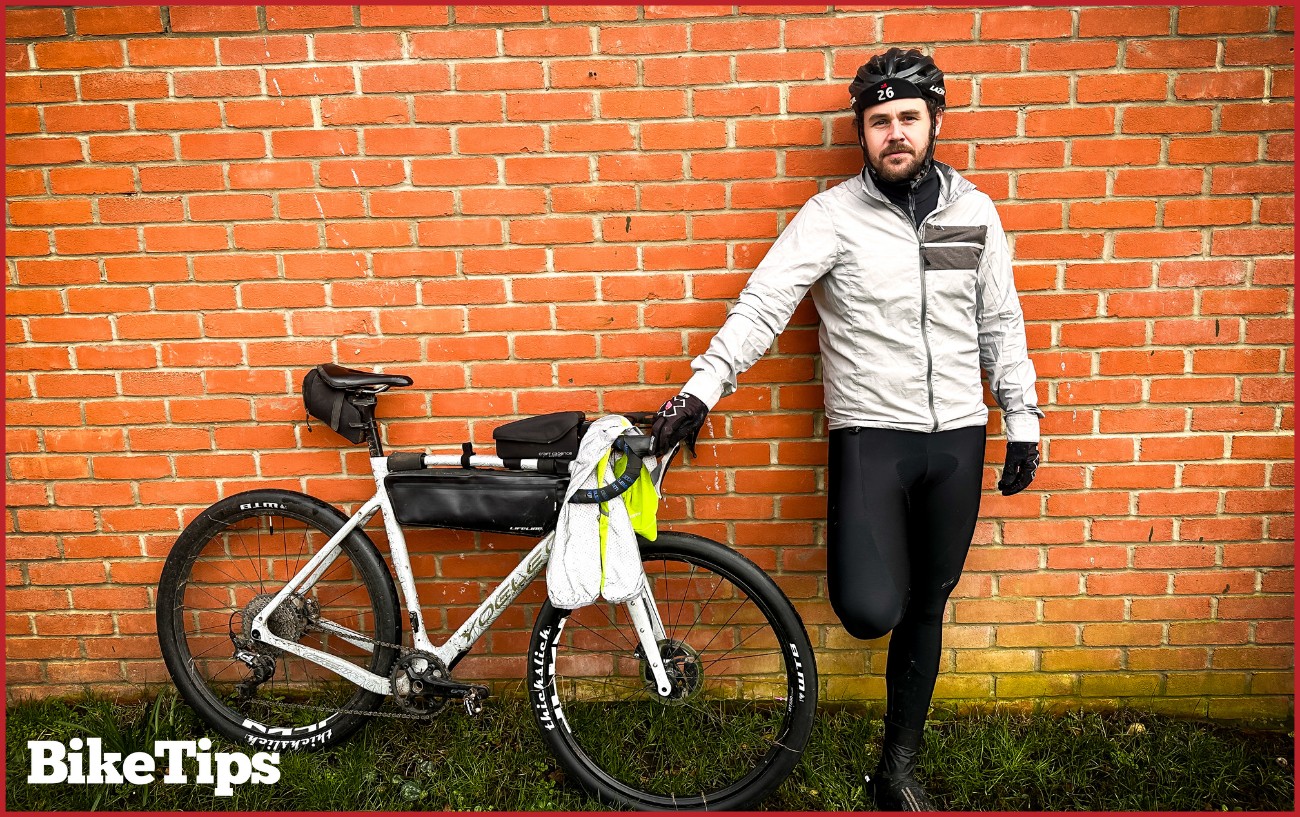 A cyclist in autumn clothing.