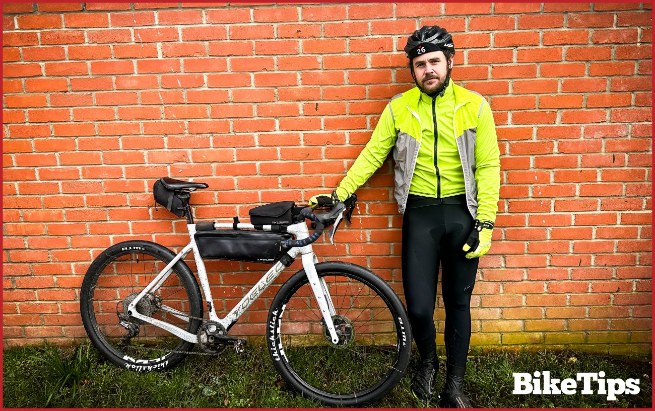 A cyclist in winter clothing.