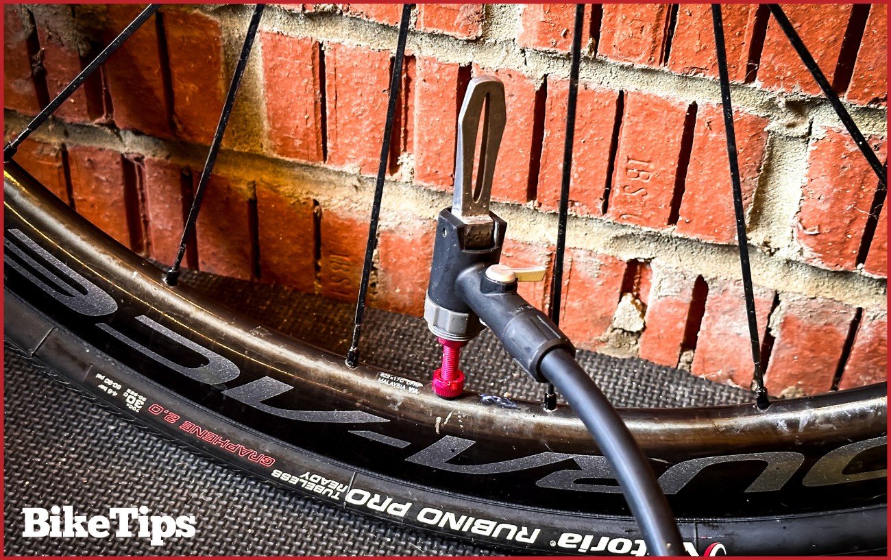 Pumping up a tubeless tire.