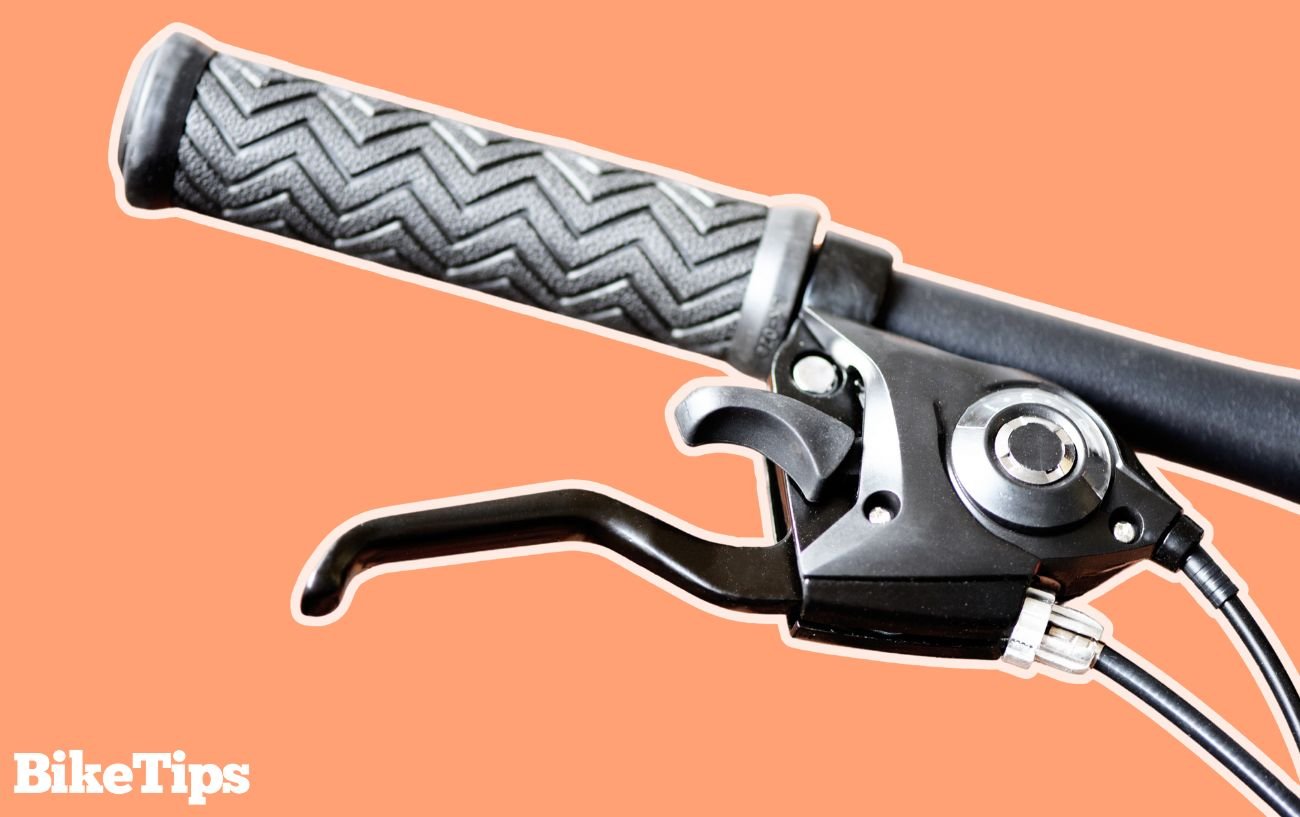 Close-up of a brake lever on a child's bike.