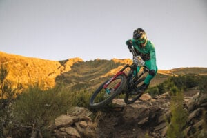 An enduro rider demonstrates the gear needed for enduro mountain bike racing.