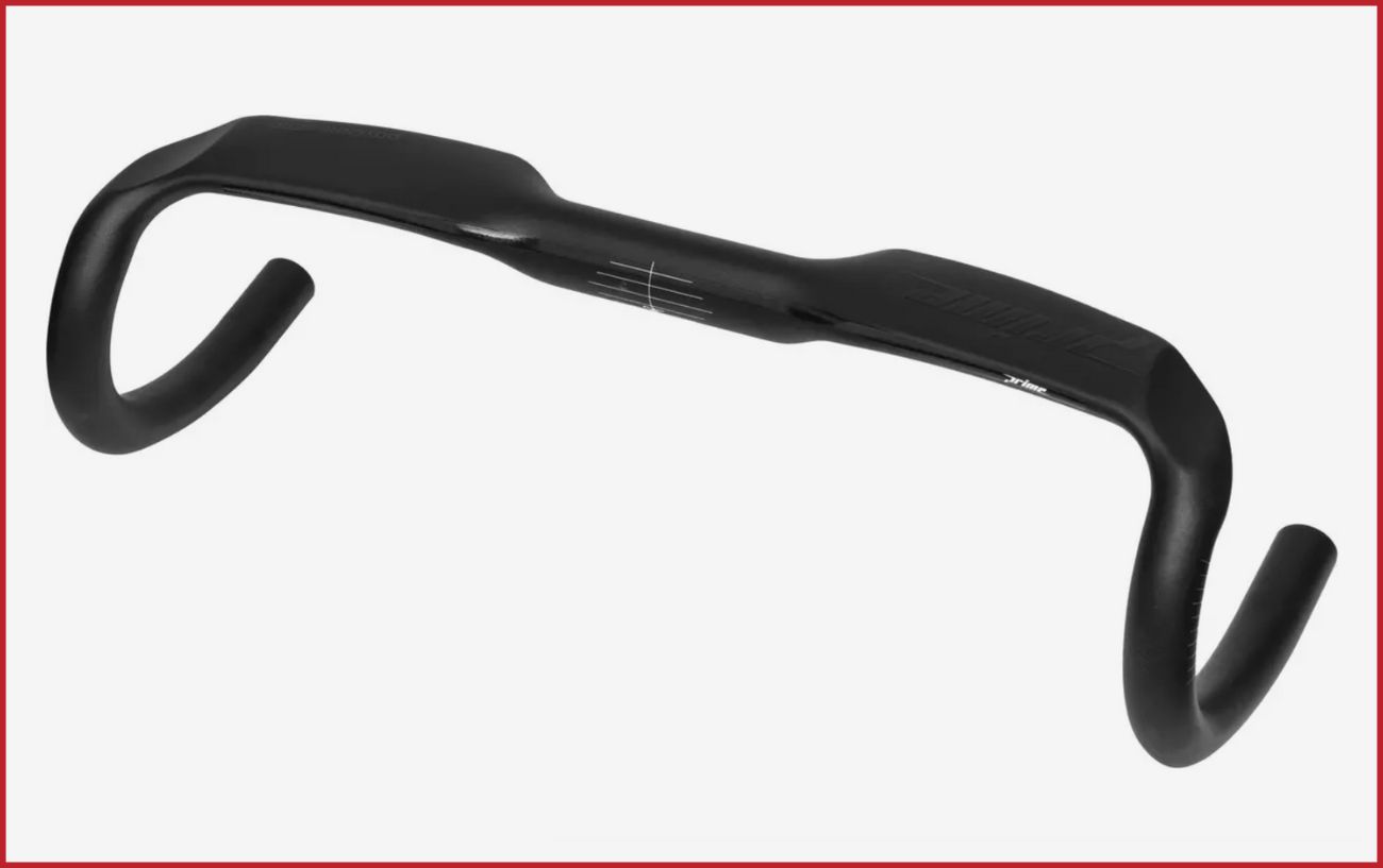 Black aero drop handlebars for a road bike.